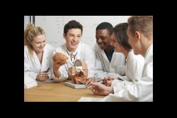Students in a group in lab coats