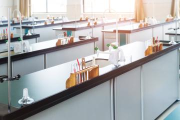 Modern Science classroom with equipment on the workbenches set up for chemistry experiments