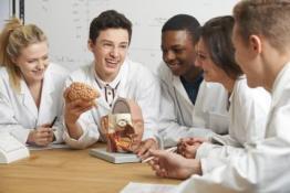 Students in a group in lab coats